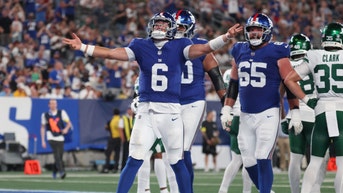 New York Giants QB Jaxson Dart celebrates his rushing touchdown vs. the New York Jets at MetLife Stadium in the 2025 NFL preseason. (Photo Credit: Vincent Carchietta-Imagn Images)