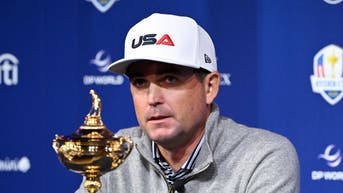 Keegan Bradley and the Ryder Cup trophy