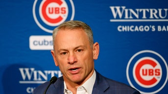 Jed Hoyer at a press conference
