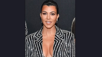 Kourtney Kardashian lingerie nipple chain thirst trap