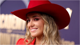 Country star Lainey Wilson shared a funny story about going to a strip club with Hardy. Watch her interview with Theo Von. What is the story? (Photo by Christopher Polk/Penske Media via Getty Images)