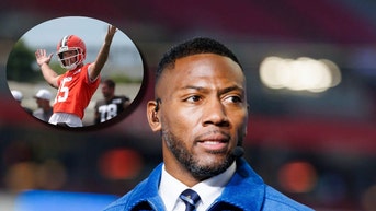 Ryan Clark and Joe Flacco of the Browns