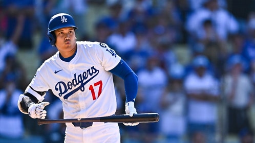 Shohei Ohtani holding a baseball bat