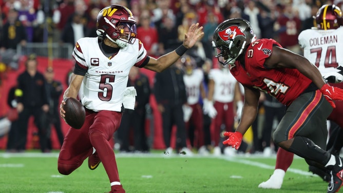 Washington Commanders QB Jayden Daniels scrambles against the Tampa Bay Buccaneers during the 2025 NFC Wild Card round. (Photo credit: Kim Klement Neitzel-Imagn Images)
