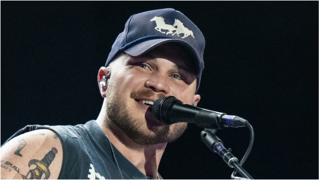 Country star Zach Bryan is getting dragged online after trying to go after his haters. What are the reactions? What did he tweet? (Photo by Timothy Norris/Getty Images for Stagecoach)