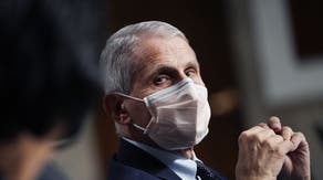 Anthony Fauci wearing a COVID mask