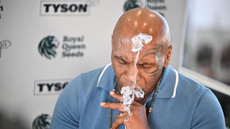 Mike Tyson smoking.