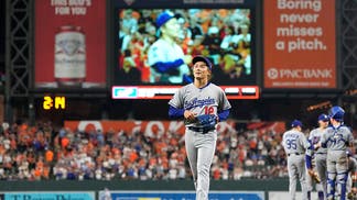 Yoshinobu Yamamoto walking off the mound in Baltimore