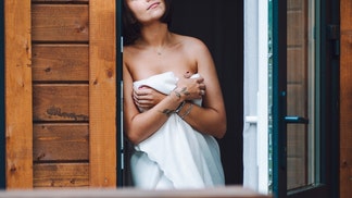 massage parlor owner arrested after answering door naked raised suspicions