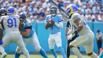 Cam Ward tossing a pass for the Tennessee Titans