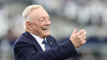 Jerry Jones smiling