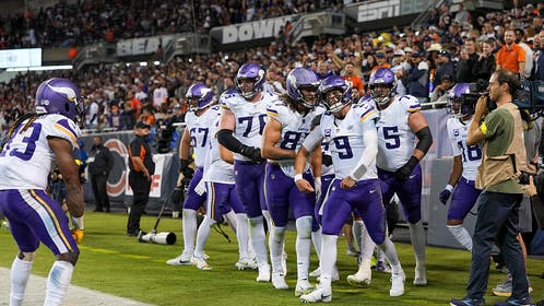 Vikings celebrate a touchdown in Chicago
