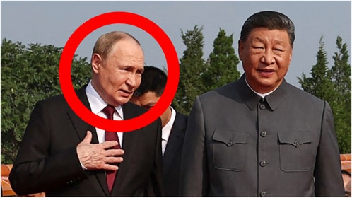 Russian leader Vladimir Putin and Chinese dictator Xi Jinping were caught on a hot mic talking about becoming immortal. Watch a video of their comments. (Photo by ALEXANDER KAZAKOV/POOL/AFP via Getty Images)