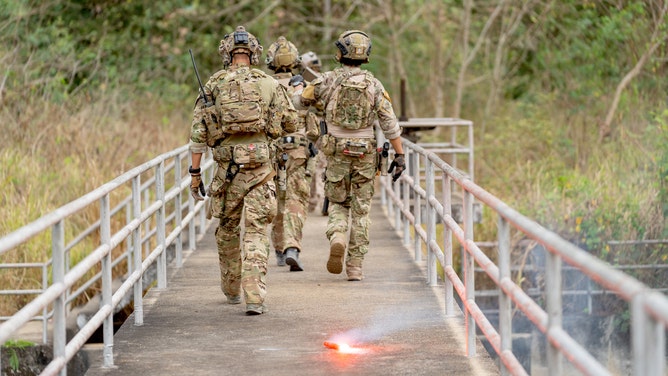 Secret Military Unit Caught On Camera, Features Unexpected Creature: PHOTO
