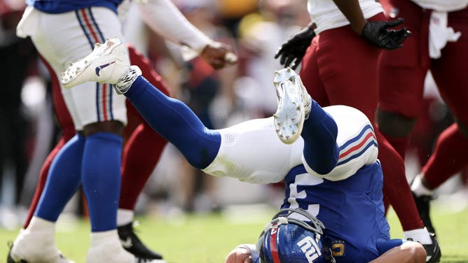 giants fan fights two commanders fans in parking lot
