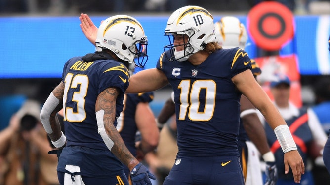 Los Angeles Chargers QB Justin Herbert and WR Keenan Allen celebrating a touchdown at SoFi Stadium in California. (Photo credit: Orlando Ramirez-Imagn Images)