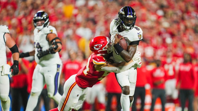 Baltimore Ravens QB Lamar Jackson is tackled by Kansas City Chiefs LB Leo Chenal at GEHA Field at Arrowhead Stadium. (Photo Credit: Jay Biggerstaff-Imagn Images)