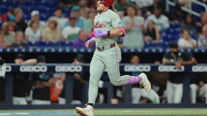 Crazy Phillies Fan Chases Down Dad To Get Home Run Ball From A Kid: WATCH