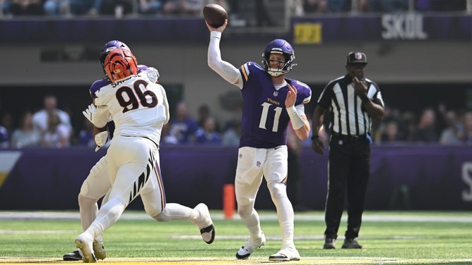 Minnesota Vikings QB Carson Wentz throws downfield against the Cincinnati Bengals at U.S. Bank Stadium in NFL Week 3. (Photo credit: Jeffrey Becker-Imagn Images)