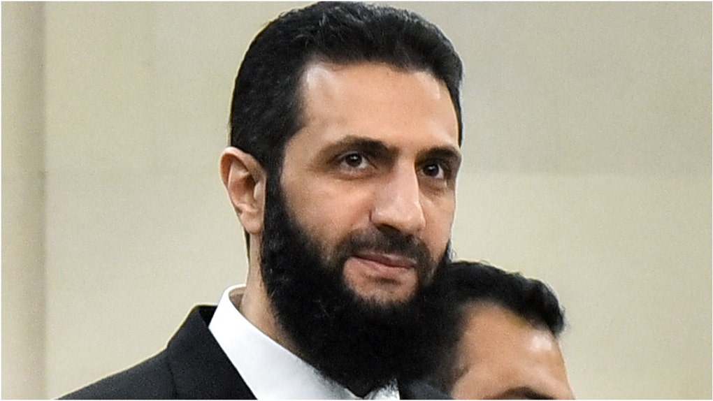 "60 Minutes" interviewed Syrian leader Ahmed al-Sharaa, and it included a laugh-out-loud funny. Watch the video. Is Ahmed al-Sharaa a terrorist? (Photo by -/AFP via Getty Images)