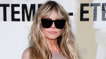 Heidi Klum frees the nipple at Paris Fashion Week with see-through dress