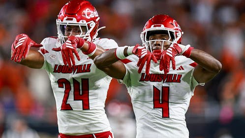 Hurricane Of A Shocker: Louisville Ruins Miami's Perfect Season, Shocks College Football