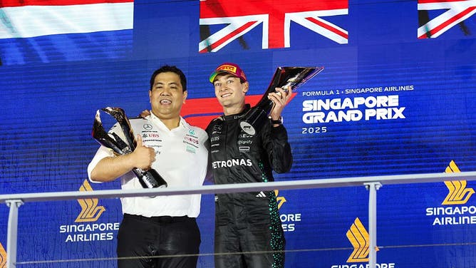 F1 Podium Celebration Forces Petronas CEO To Apologize For Champagne Spray