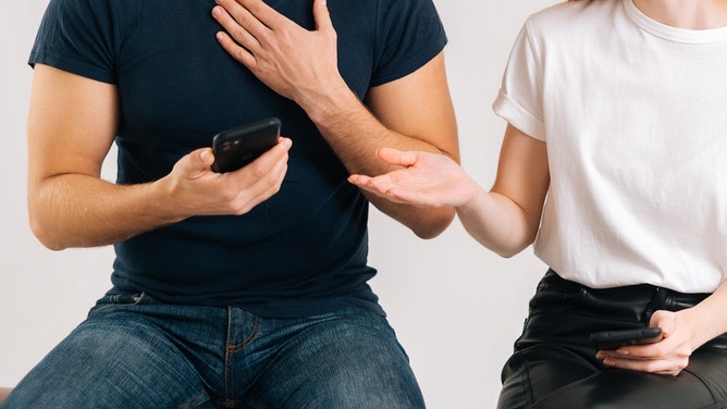 man's girlfriend is being hit on by her married boss