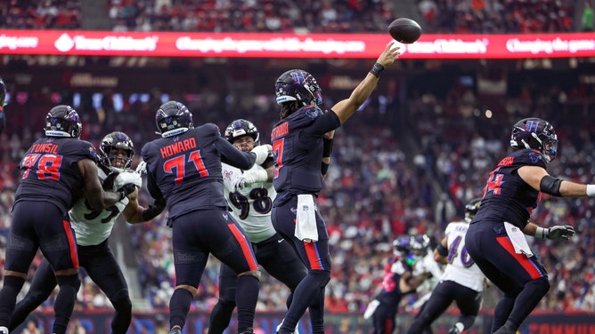 Texans QB C.J. Stroud attempts a pass against the Baltimore Ravens at NRG Stadium in Houston, Texas. (Photo Credit: Troy Taormina-Imagn Images)