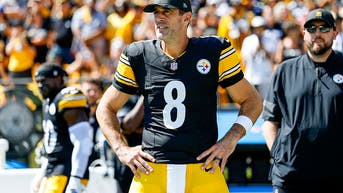 Aaron Rodgers on the Pittsburgh Steelers sideline
