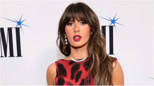 Ella Langley stole the show at the BMI Awards with her red outfit. Check out a video and photos of the outfit. Who is Ella Langley? What are her popular songs? (Credit: Emma McIntyre/Getty Images for BMI)