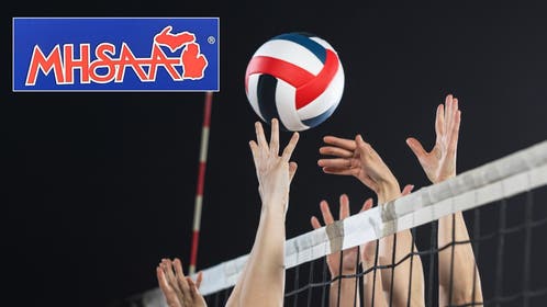Stock photo of girls playing volleyball with an MHSAA logo.