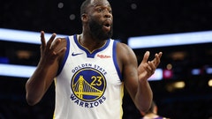 Draymond Green with his hands up