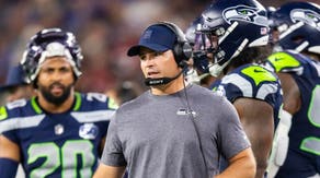 Seattle Seahawks head coach Mike Macdonald on the sideline during a game against the Arizona Cardinals at State Farm Stadium.