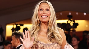 Molly Sims in a bikini at the beach in Miami