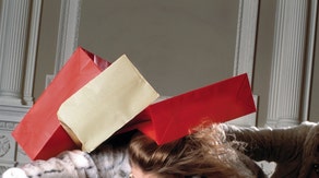 women fight in mall parking lot while christmas shopping