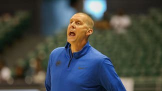 Mark Pope of Kentucky shouting at players