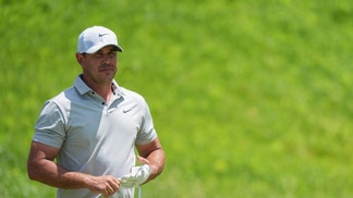 Brooks Koepka walking down the fairway