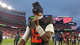 Cleveland Browns rookie QB Shedeur Sanders on the field after a loss to the Titans.
