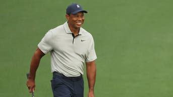Tiger Woods smiling
