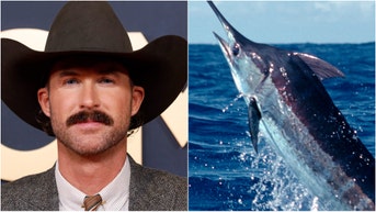 Riley Green battles 300 pound marlin in awesome fishing video. (Photo by Taylor Hill/WireImage via Getty Images and Getty Images Creatives)