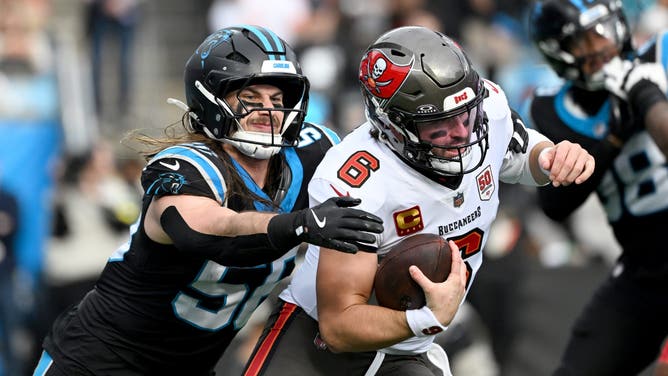Carolina Panthers linebacker Christian Rozeboom sacks Tampa Bay Buccaneers quarterback Baker Mayfield during the first half of an NFL Week 16 game at Bank of America Stadium. 