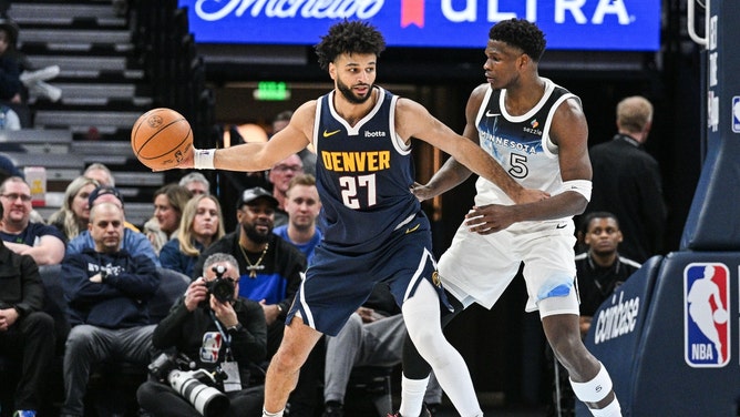 Denver Nuggets PG Jamal Murray posting up Minnesota Timberwolves SG Anthony Edwardsat Target Center. (Photo Credit: Jeffrey Becker-Imagn Images)
