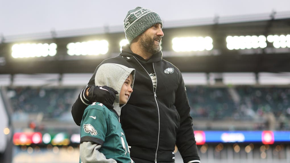 Head coach Nick Sirianni of the Philadelphia Eagles and his son, Jacob, take a photo before the NFC Wild Card Playoff game against the San Francisco 49ers at Lincoln Financial Field on January 11, 2026 in Philadelphia, Pennsylvania.