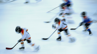 Youth Hockey Game Erupts Into Wild Brawl During AHL Intermission: WATCH