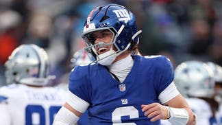 New York Giants QB Jaxson Dart smiles after a fourth quarter touchdown against the Dallas Cowboys at MetLife Stadium in NFL Week 18.