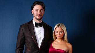 Livvy Dunne stuffed into red dress at MLB Awards with Paul Skenes