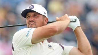 bryson dechambeau hitting a tee shot