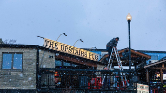 Indiana Fans Brave Frigid Temps To Camp Outside Bars Before National Title Game
