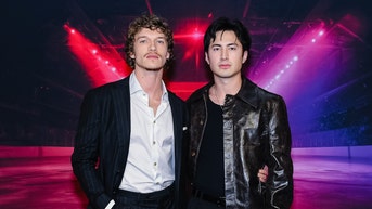 Connor Storrie and Hudson Williams at the premiere of "Heated Rivalry" at TIFF Lightbox.  